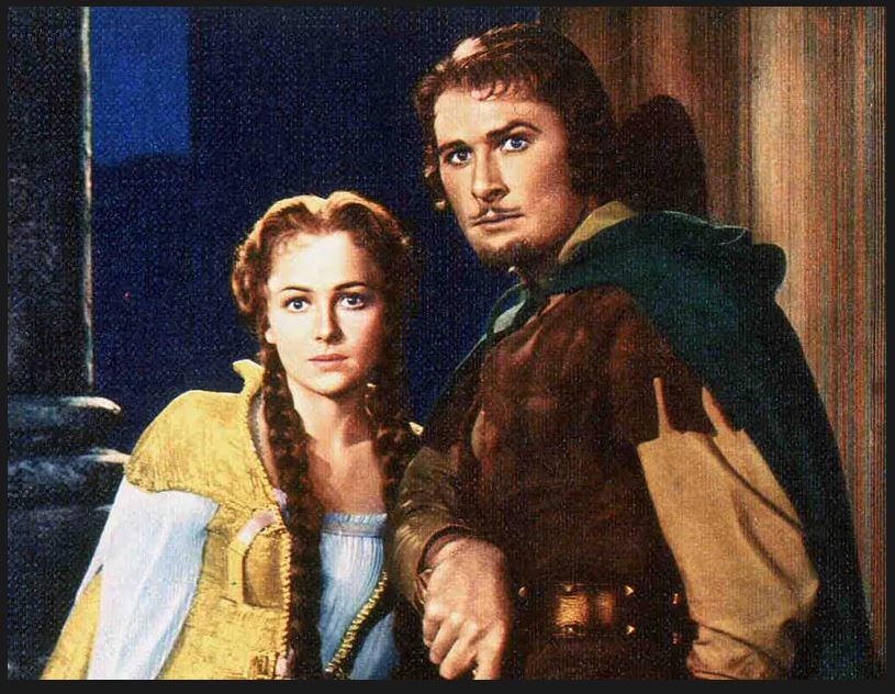 Errol Flynn a Olivia de Havilland vo filme Dobrodruzstvá Robina Hooda (1938)